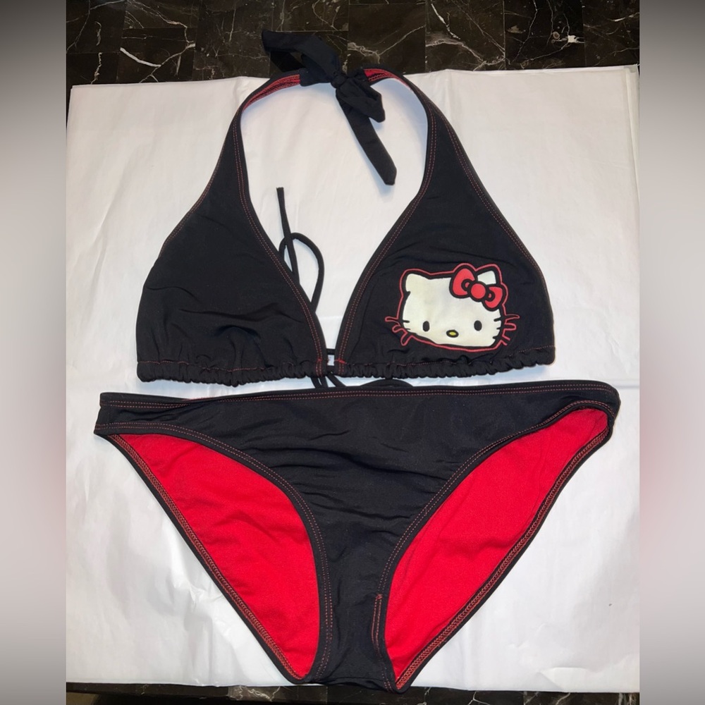 Adorable Hello Kitty string bikini. Exc condition. XL top, L bottoms. Black/red.